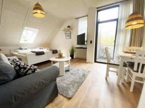 Ferien im Wangerland - Haus Wiesenweg - Apartment 2 1OG